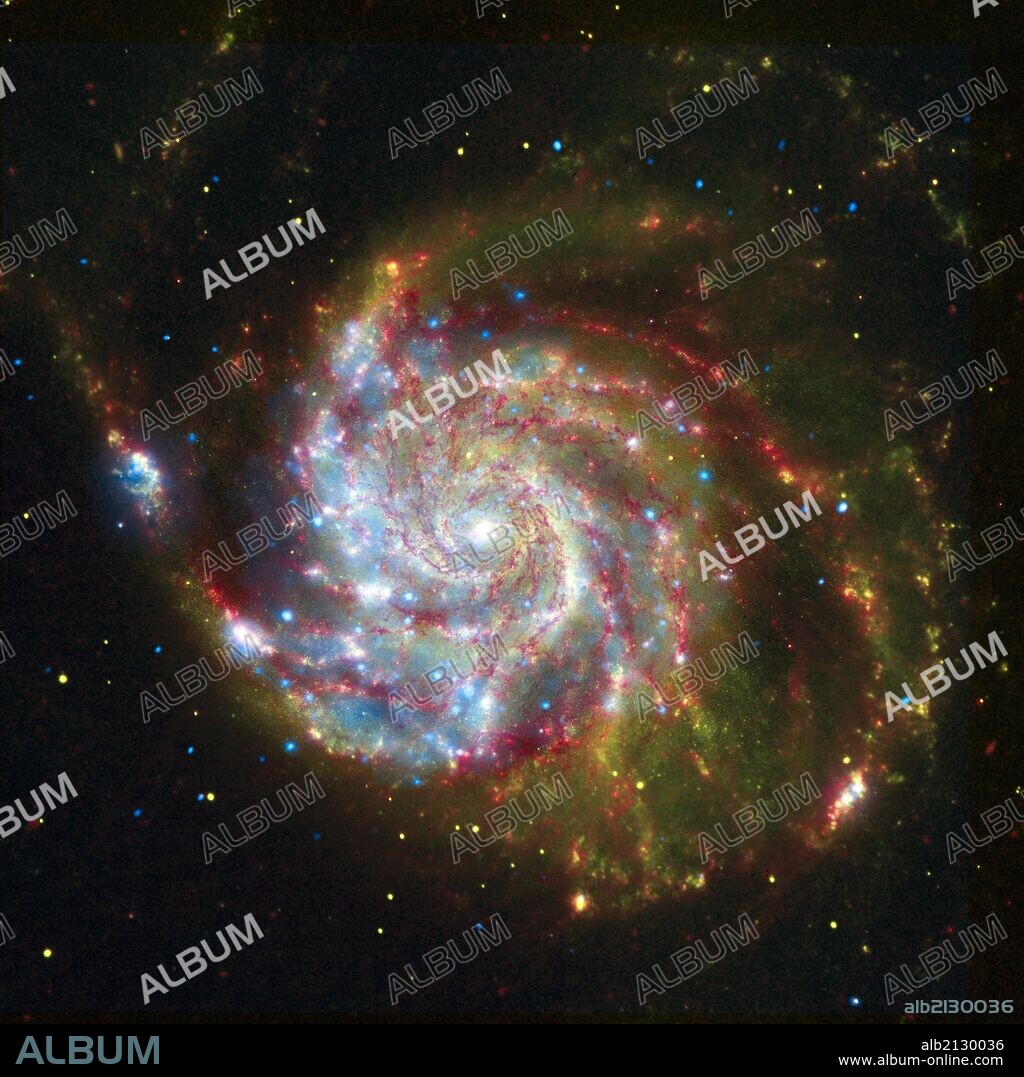 The spiral galaxy Messier 101, from composite of views from Spitzer, Hubble, and Chandra. (Photo by: Universal History Archive/UIG via Getty Images).