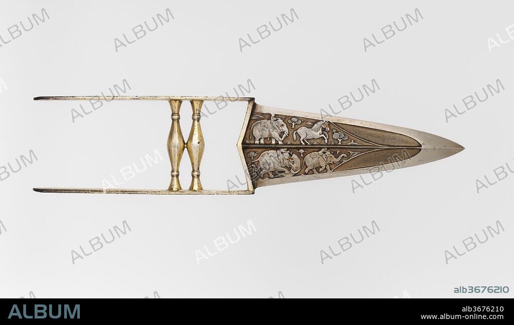 Punch Dagger (Katar) with Sheath. Culture: Indian, Mughal. Dimensions: L. 14 in. (35.6 cm); L. of blade 7 1/4 in. (18.4 cm);  W. 3 3/16 in. (8.1 cm); Wt. 15.2 oz. (430.9 g). Date: late 17th-18th century.
Daggers of this ancient Indian type are known variously as a <i>katar</i> (piercing dagger) or <i>jamadhar</i> (death tooth). Gripped in the fist, they were intended to deliver a deadly punching blow and were used in both war and the hunt. The blade of this example is notable for the delicately chiseled figures of elephants and horses engaged in the hunt.
