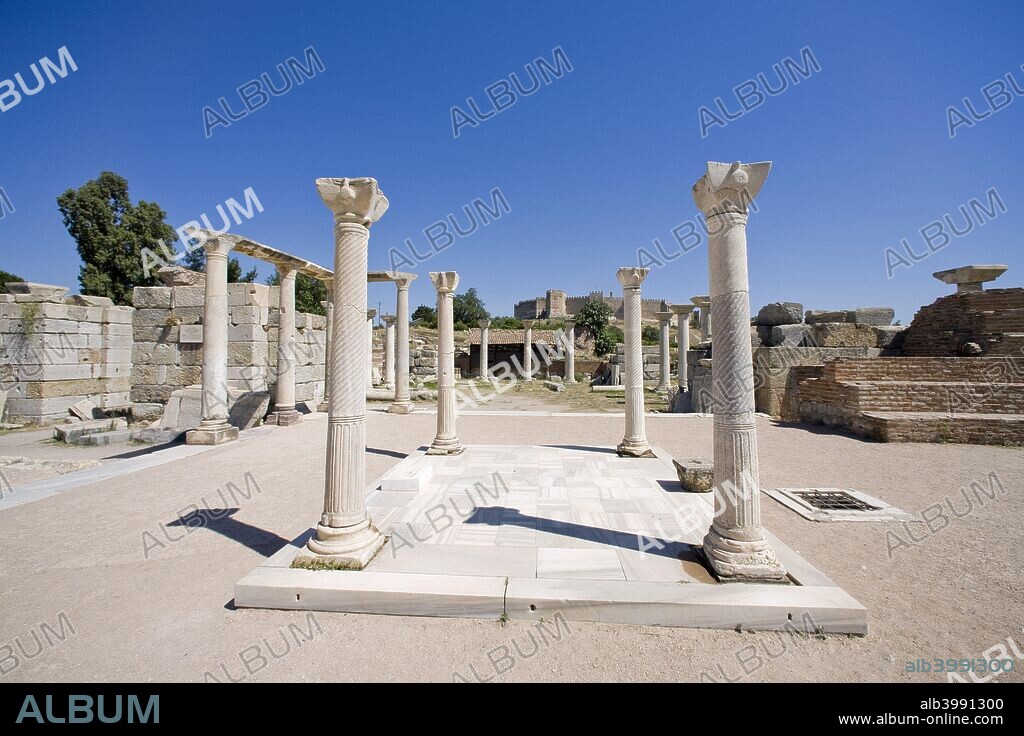 The Church of St John, Ephesus, Turkey. This monumental basilica was built in the shape of a cross and was covered with six domes. Raised by two steps and covered with marble, the tomb of St John was under the central dome. The columns in the courtyard reveal the monograms of Emperor Justinian and his wife Theodora. Constructed in the 5th century, the baptistery is north of the nave. Rampart walls around the church were constructed for protection from Arabian attacks in the 7th and 8th centuries. Ephesus was once the most important commercial centre of the ancient world and also a religious centre for early Christians. It was one of the twelve cities of the Ionian League during the Classical Greek period.