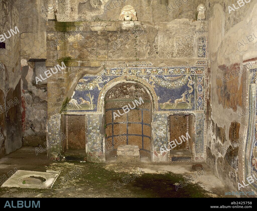 Italy. Herculaneum. Ancient Roman city destroyed by the eruption of the Vesuvius in 79 AD. The atrium of the House of Neptune and Amphitrite. 1st century. Nympheum and indoor fountain. Campania.
