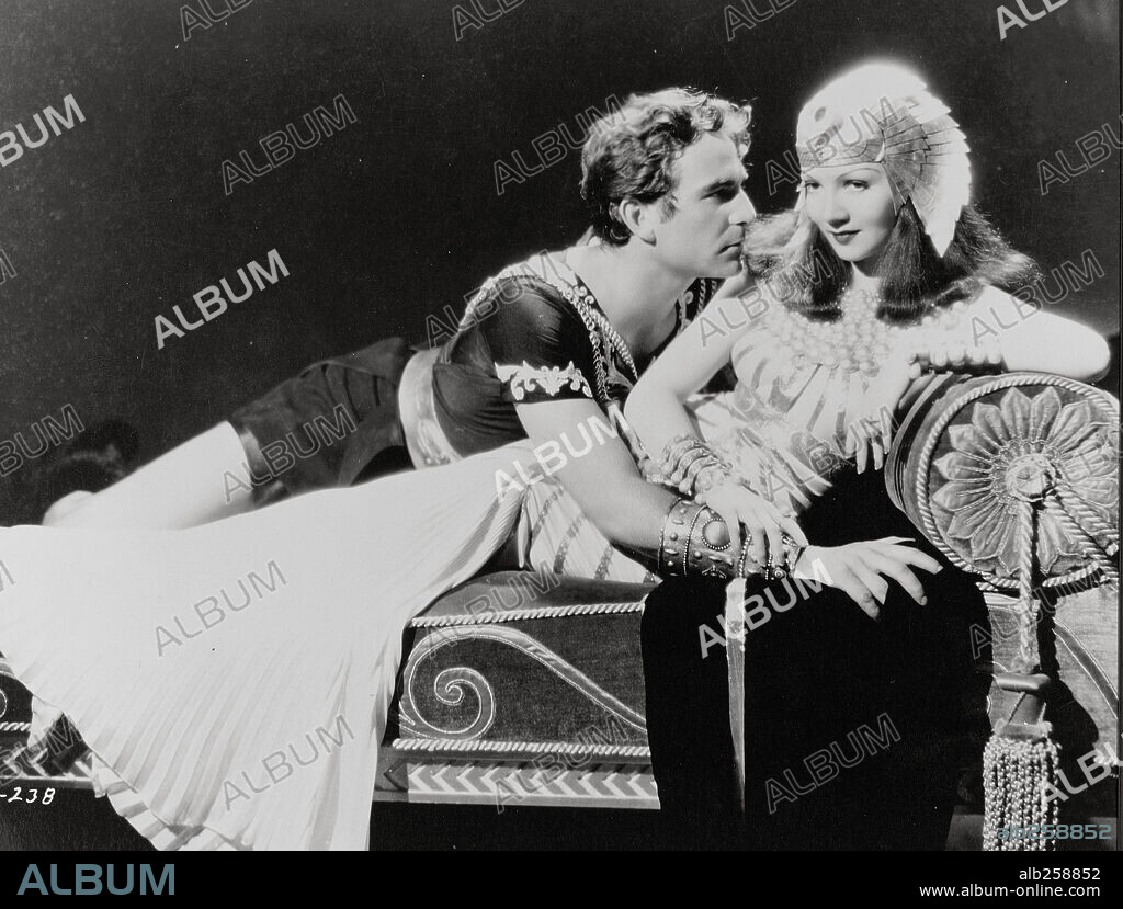 CLAUDETTE COLBERT and HENRY WILCOXON in CLEOPATRA, 1934, directed by CECIL B DEMILLE. Copyright PARAMOUNT PICTURES.