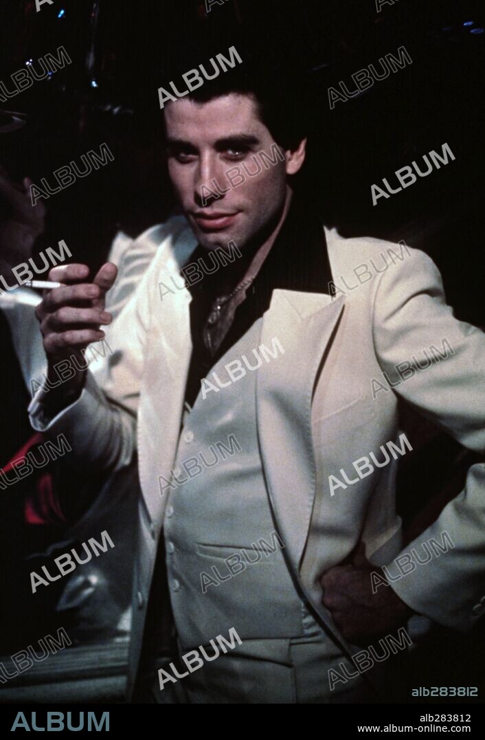 TRAVOLTA JOHN. JOHN TRAVOLTA in SATURDAY NIGHT FEVER, 1977, directed by JOHN BADHAM. Copyright PARAMOUNT PICTURES.