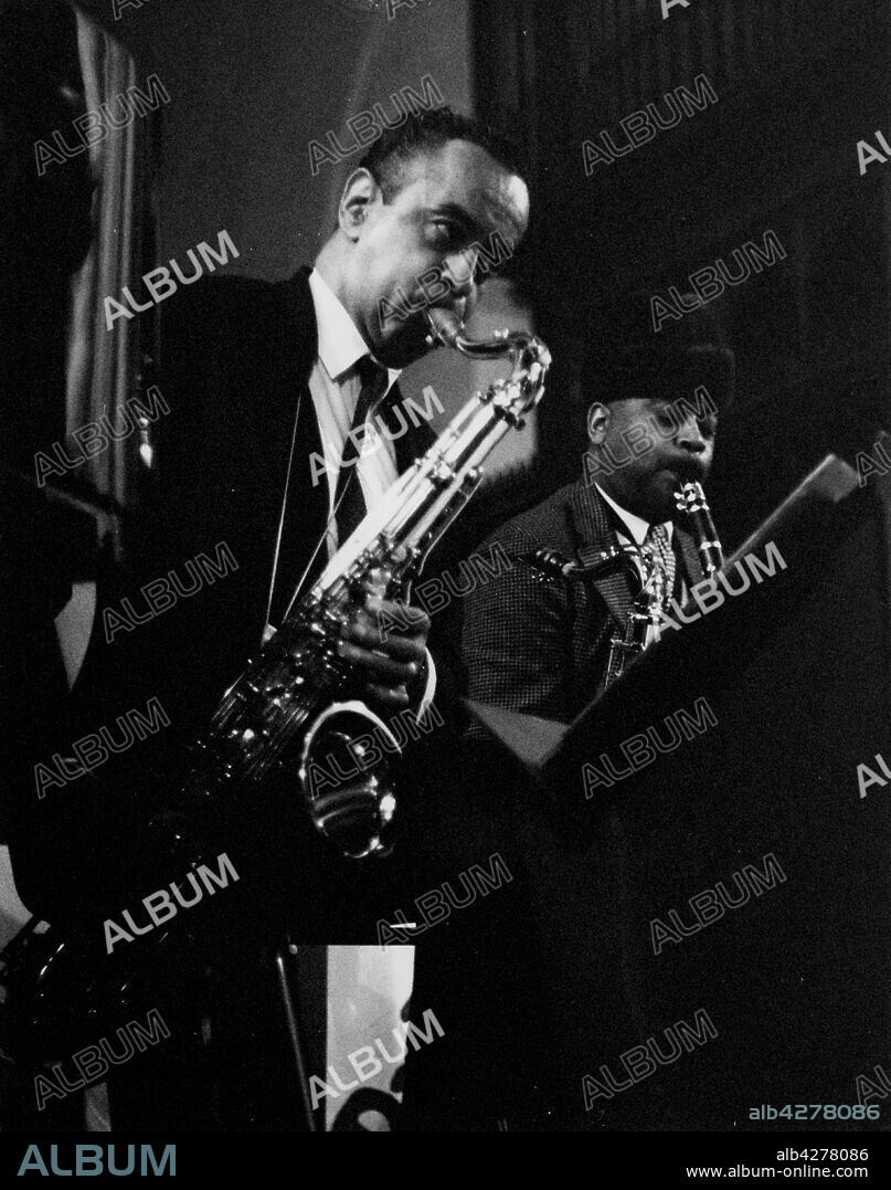 BRIAN FOSKETT. Paul Gonsalves (tenor sax) and Lawrence Brown (trombone), rehearsal for a Sacred Concert, Cambridge, 1967. On February 20, 1967, Duke Ellington?s 15-piece ensemble, featuring many of jazz?s all-time greats, played a two-hour special concert in Cambridge. 1,300 people packed into the church, for the one-off show; which featured tap-dancing, and a lengthy drum solo. As well as Ellington at the keyboard, other star players on the night included trumpet player Cat Anderson, saxophonist Johnny Hodges, drummer Rufus ?Speedy? Jones, and Esther Marrow on vocals.