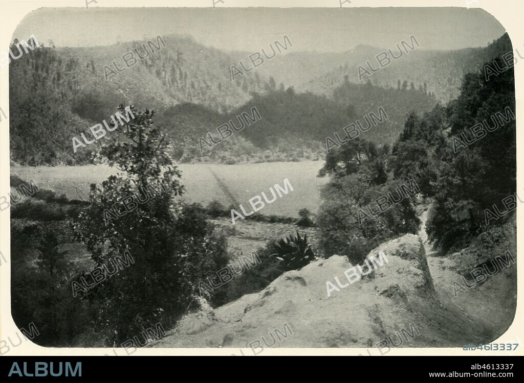 'Pine-Clad Hills Forming the Rim of the Valley of Mexico, 8,000 Feet Elevation Above Sea-Level', 1919. From "Mexico", by C. Reginald Enock, F.R.G.S. [Charles Scribner's Sons, New York, 1919].
