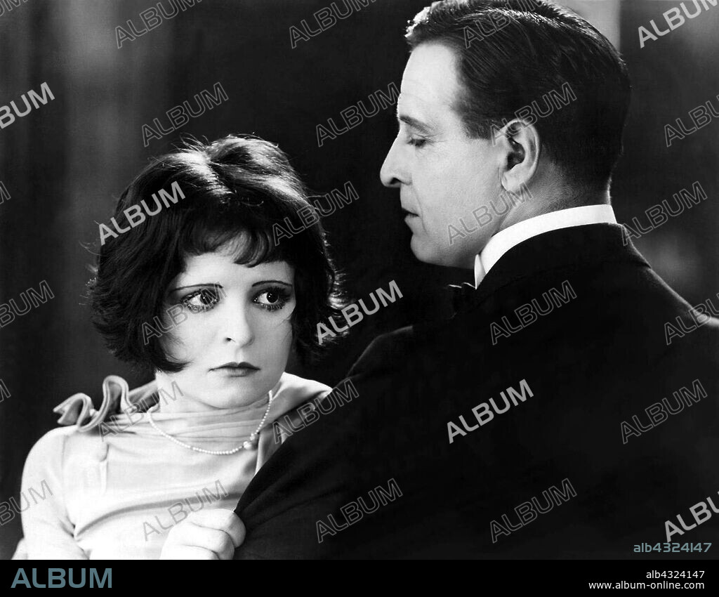 CLARA BOW and CONWAY TEARLE in DANCING MOTHERS, 1926, directed by HERBERT BRENON. Copyright PARAMOUNT PICTURES.