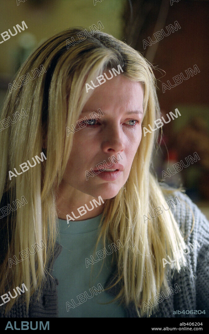KIM BASINGER in 8 MILE, 2002, directed by CURTIS HANSON. Copyright UNIVERSAL STUDIOS / REED, ELI.