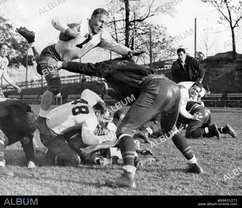 New York, New York, November 23, 1938 Eddie Jankowski and his Green Bay Packers team practicing for their Sunday football game with the New York Giants.