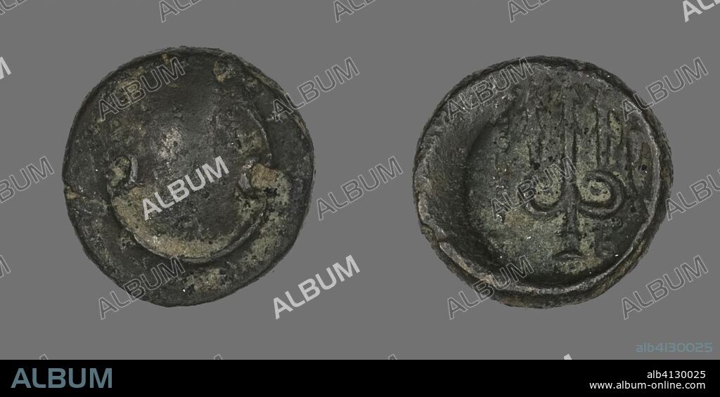 ANCIENT GREEK. Coin Depicting a Boeotian Shield. Greek; Boeotia. Date: 196 BC-146 BC. Dimensions: Diam. 1.4 cm; 1.99 g. Bronze. Origin: Ancient Greece.