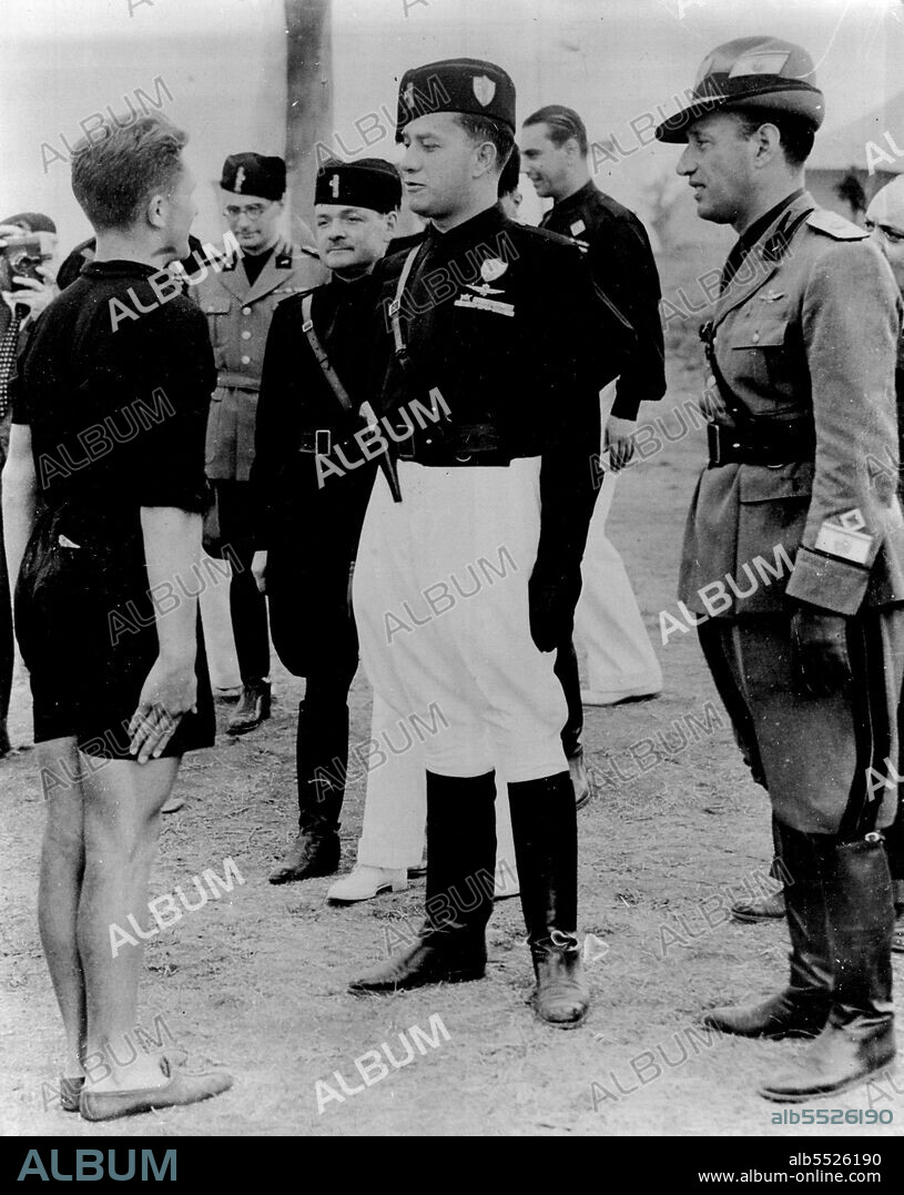 Mussolini's Son-in-Law Visits Boy's Camp:Count Ciano, son in law of Mussolini and member of the Cabinet, photographed as he chatted to a young Italian during his visit to the Mussolioni camp near Rome. September 8, 1936. (Photo by Keystone).