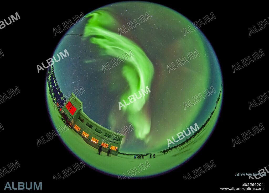 The aurora borealis of February 3-4, 2014 seen from Churchill, Manitoba, Canada, at the Churchill Northern Studies Centre, in an all-sky view with the 8mm fish-eye lens. This is looking north and east. Members of the aurora tour group are in the foreground.