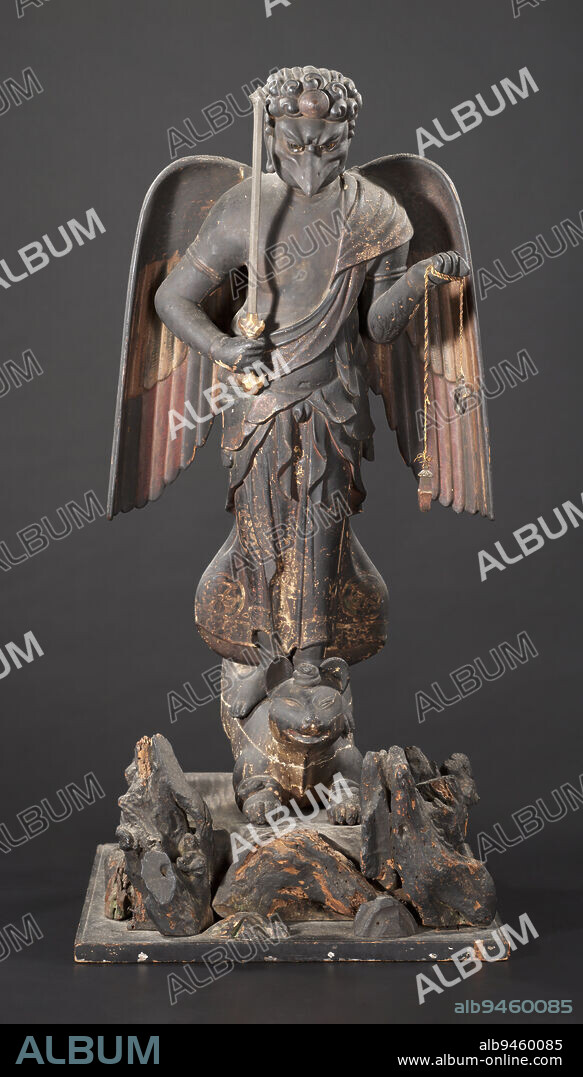 Akiba Gongen, Manifestation of Mount Akiba, early 17th century, Unknown Japanese, 34 1/2 × 16 1/4 × 16 1/2 in. (87.63 × 41.28 × 41.91 cm), Wood with polychrome and gold, 17th century, This deity, known as the Manifestation of Mount Akiba in Echigo Province, is worshipped as a protector against fire. Also called Akiba Gongen, the deity is commonly portrayed as a figure with elements of the Shinto tengu, the Buddhist Wisdom King Fud My, and the Hindu goddess Dakini. Shinto tengu are fierce, long-beaked, and winged goblins with a birds face and a human body, and we can see those features here. Like the Buddhist Wisdom King Fud My, Akiba Gongen is dressed as a Buddhist monk and holds a double-edged sword and a rope. Dakini is a Hindu goddess who rides on a white fox and flies through the sky, just as Akiba Gongen does.