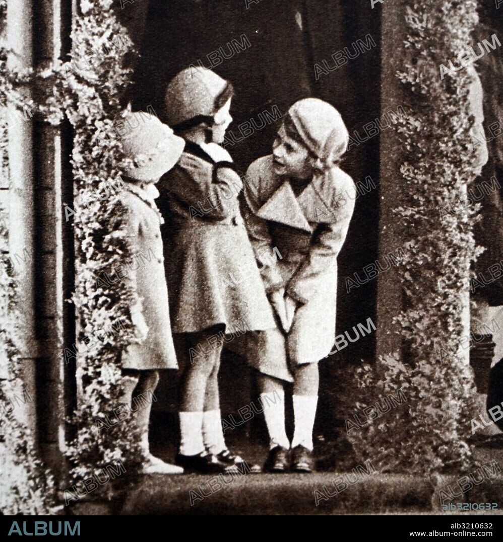 Photograph of young Princess Elizabeth (1926-), Princess Margaret (1930-2002) and their cousin Margaret Elphinstone (Margaret Rhodes) (1925-) during the Royal Highland Society in Princess Royal Park. Dated 20th Century.