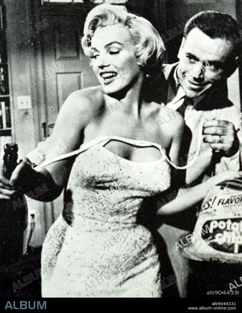 Film still from 'The Seven Year Itch' starring Marilyn Monroe (1926-1962) an American actress and Tom Ewell (1909-1994) an American film, stage and television Actor. Dated 20th Century.