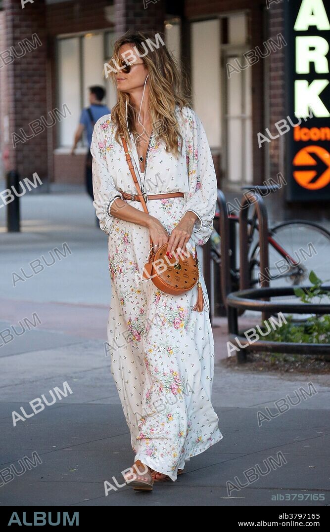June 29, 2018 - New York, New York, United States - TV personality Heidi Klum picks up her children Lou Samuel and Johan Samuel from the bus stop as they return from summer camp in Tribeca on June 29 2018 in New York City. 29/06/2018