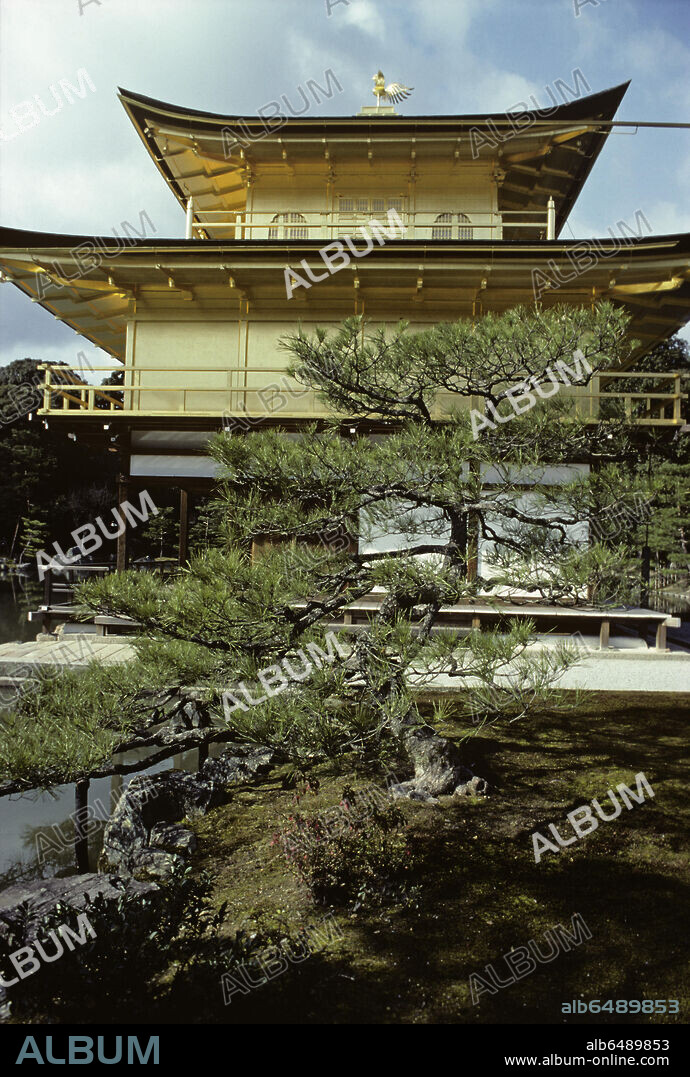 Kinkaku - the Golden Pavilion - is the name given to Rokuon-ji Temple on Kyoko-chi pond in Kyoto. Built as a 
villa for the retirement of the 3rd Shogun of Ashikaga in 1394, it was made into a Zen-temple according to the Shogun's will. The second and third floors are covered with gold leaf on Japanese lacquer; on the roof is a golden phenix.