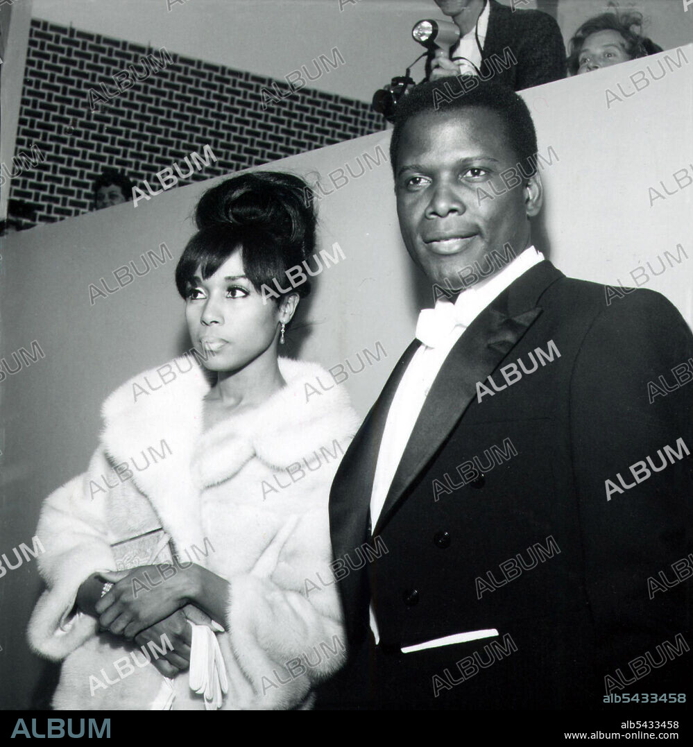 DIAHANN CARROLL y SIDNEY POITIER. DIANE CARROLL AND SIDNEY POITIER AT THE 36TH ANNUAL ACADEMY AWARDS.(Credit Image: Â© Globe Photos/ZUMA Wire).