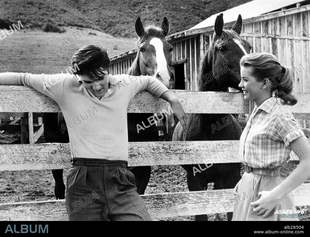 DOLORES HART and ELVIS PRESLEY in LOVING YOU, 1957, directed by HAL KANTER. Copyright PARAMOUNT PICTURES.