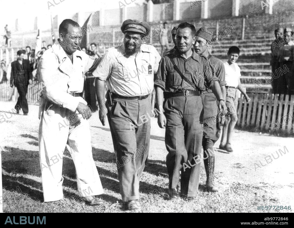 1938. Valentín González, "the Peasant" (2nd Left.