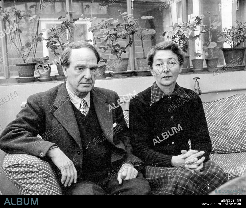 Henry Moore And His Wife -- Mr. Henry More, the sculptor, portrayed with Mrs. Moore, nee Irene Radetzky, at his studio in Hertfordshire; they were married in 1929, and have one daughter. April 12, 1954. (Photo by Jitendra Arya, Camera Press).