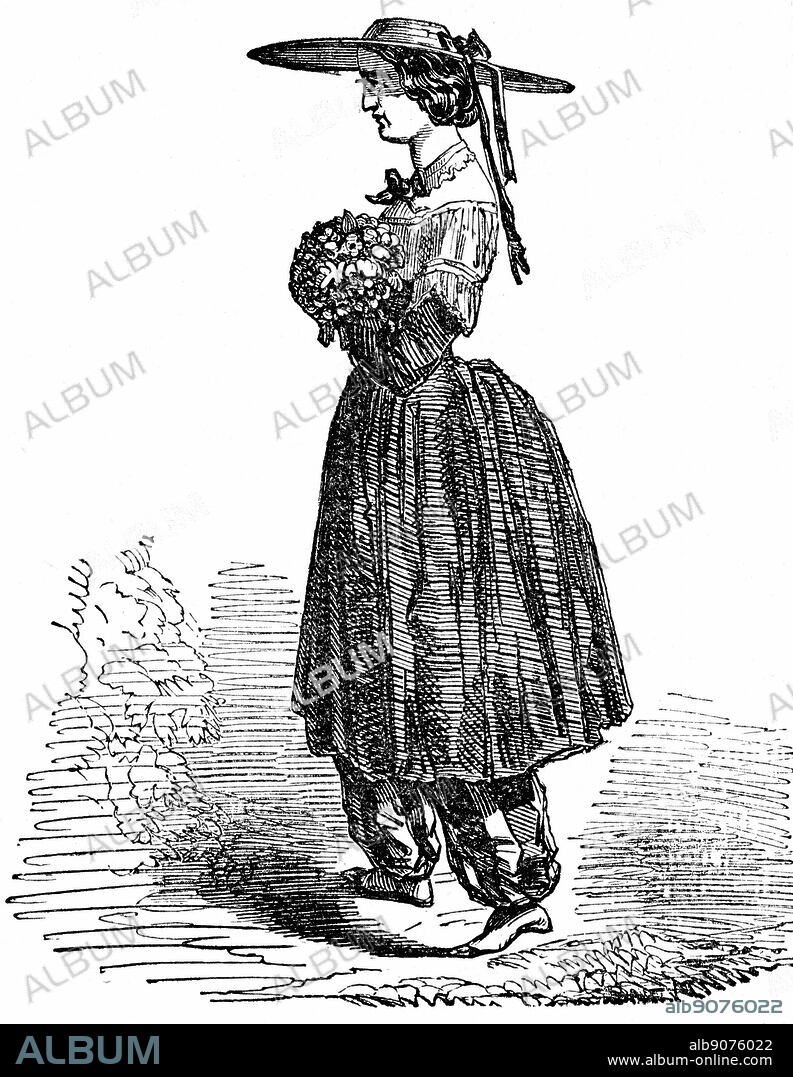 Amelia Bloomer (1818-1894) American feminist and champion of dress reform. The style of dress for women she designed and wore, and which gave the name of Bloomers for women's nether garments. Wood engraving, London, 1869.