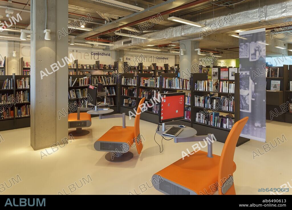 DOK LIBRARY CONCEPT CENTER (2007) DOK LIBRARY CONCEPT CENTER, DELFT, NETHERLANDS. ARCHITECT: DOK ARCHITECTEN, AEQUO, 2007. BOOKSHELVES WITH ORANGE CHAIRS.