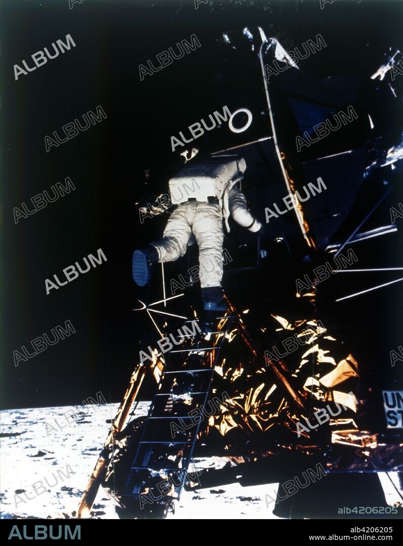 Buzz Aldrin descends from the Lunar Module, Apollo II mission, July 1969. Edwin "Buzz" Aldrin (b1930) descends the steps of the Lunar Module ladder to walk on the Moon. The Apollo 11 Lunar Module, code named Eagle, with US astronauts Neil Armstrong and Buzz Aldrin on board, landed in the Sea of Tranquillity on 20 July 1969. Apollo 11 was the fifth manned Apollo mission, and was the first to land on the Moon.