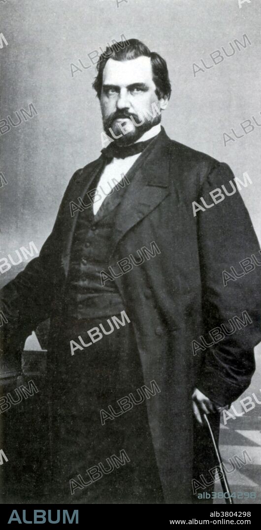 Stanford stood for this portrait about the time he completed his Central Pacific Railroad, 1869. Amasa Leland Stanford (March 9, 1824 - June 21, 1893) was an American tycoon, industrialist and politician. Migrating to California from New York at the time of the Gold Rush, he became a successful merchant and wholesaler, and continued to build his business empire. In in 1868, while the Central Pacific was under construction, Stanford and his associates acquired control of the Southern Pacific Railroad. As head of the railroad company that built the western portion of the "First Transcontinental Railroad" he presided at the ceremonial driving of "Last Spike" in Promontory, Utah. In 1895, with his wife Jane, he founded Leland Stanford Junior University as a memorial for their only child, Leland Stanford, Jr., who died as a teenager of typhoid fever. The wealth of the Stanford family during the late 19th century is estimated at about $50 million (about $1.3 billion in 2010 dollars). Long suffering from locomotor ataxia, Stanford died of heart failure in 1893 at the age of 69. No photographer credited, dated 1869.