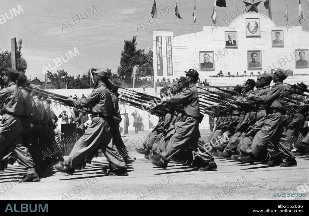 An infantry unit of the Korean People's Army marching through the Central Square in Pyongyang, North Korea. August 15th, 1953. Eight anniversary of founding of North Korean communist regime. (Photo by: Sovfoto/UIG via Getty Images).