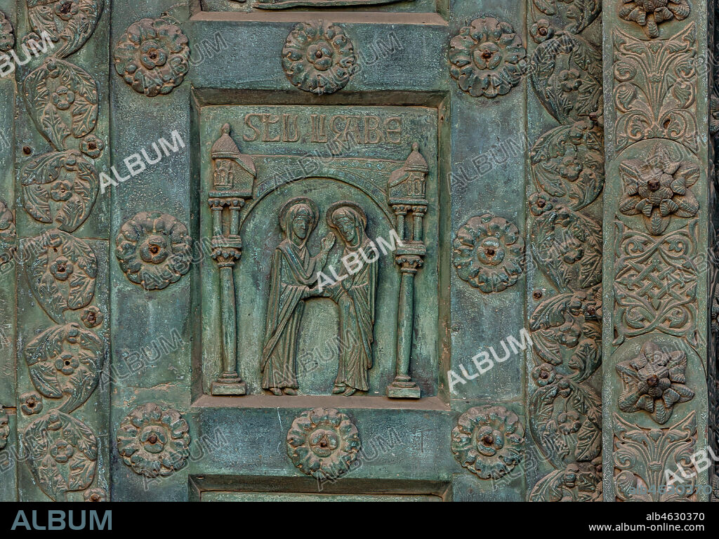 Monreale Cathedral, the gate by Bonanno Pisano (1185-6): bronze tile depicting "Visitation" (scene of the New Testament).. The gate is signed "Bonanno civis pisanus". It depicts five scenes of the Old Testament at the bottom, starting with Adam and Eve, and five scenes of the New Testament at the top, ending in "Christ and Mary in the glory of Paradise".