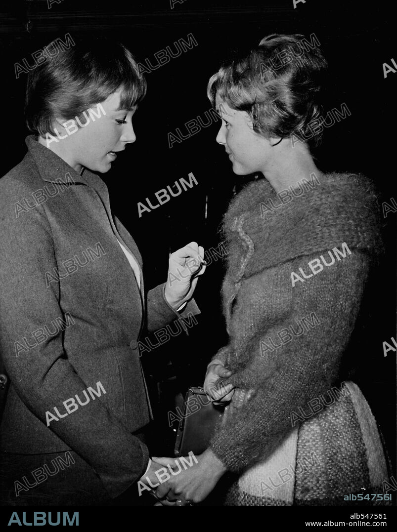 DEBBIE REYNOLDS and SHIRLEY MACLAINE in ALL IN A NIGHT'S WORK, 1961, directed by JOSEPH ANTHONY. Copyright PARAMOUNT PICTURES.