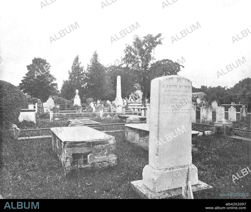 Graves of Jonathan Edwards and Aaron Burr, Princetown, New Jersey, USA, c1900. View of Princeton Cemetery and the graves of American politician Aaron Burr (1756-1836), controversial Revolutionary War hero and third Vice President of the United States, and Jonathan Edwards (1703-1758), American revivalist preacher, philosopher, president of Princeton University and Calvinist theologian. From Scenic Marvels of the New World edited by Prof. Geo.R. Cromwell. [C.N.Greig & Co., c1900].