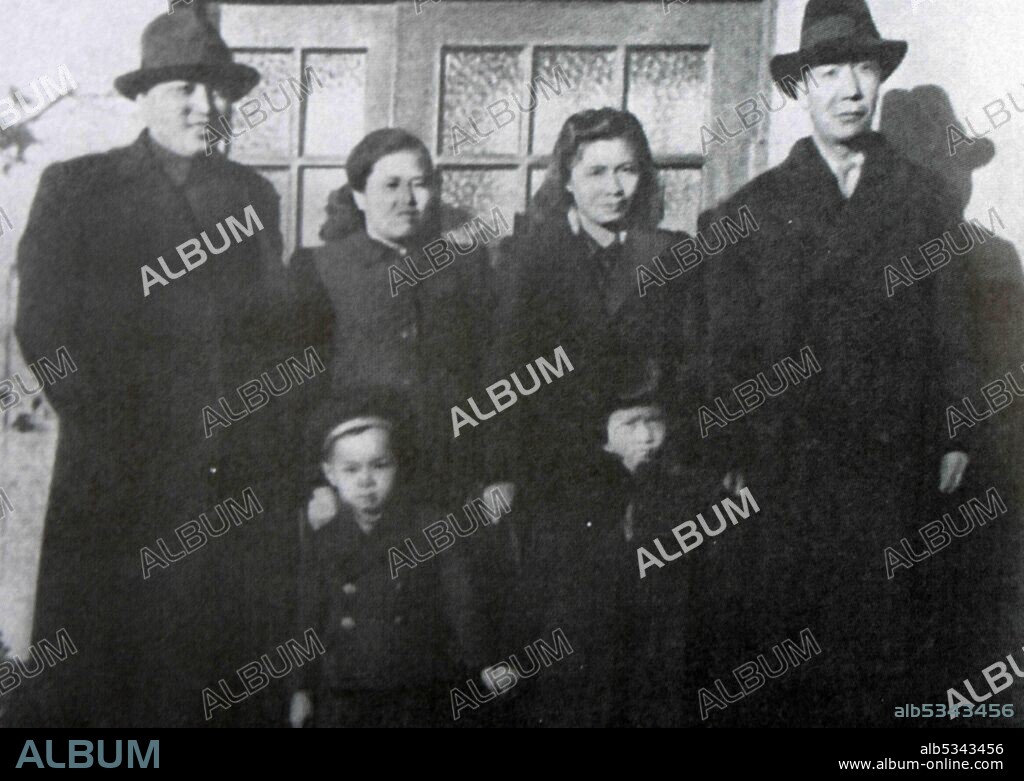 Kim Il Sung with his wife, son, Kim Jong Il, the Chinese partisan commander Zhou Baozhong (right), his wife and daughter in the USSR. 1940s.