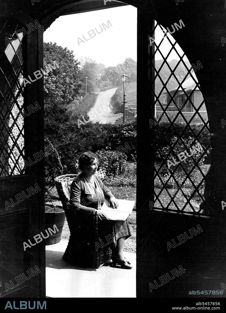 American's Wonder Woman In Scotland -- Miss Keller, reading in Braille, H.V. Morton's "In Search of Scotland" amid Scottish scenery at "Dalveen", West Kilbride, near Glasgow.Helen Keller, when 19 months old, was blind, deaf, and dumb. Now at 52, she is an Authoress famous throughout the world. Only in recent years did she recover her speech.In March 1887, a Miss Sulivan took charge of this piteous little 7 year old girl. All there was to work on was senses of smell and touch, and from that slender personality there was built up one of the most remarkable characters of the century. June 06, 1932. (Photo by Wide World Photos).