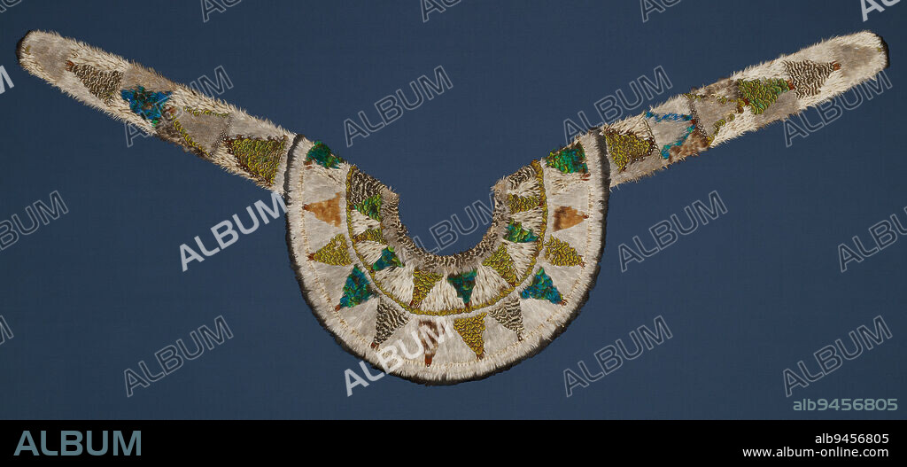 Cape, c. 1850, 33 x 79 in. (83.82 x 200.66 cm) (flat, approx.), Feathers, cotton, United States, 19th century, This cape is an example of the frequent and enduring exchange with other cultures, both Native and non-Native, that in part shapes Native art. At the start of the 1800s, Native peoples experienced countless changes to their way of life. This feathered cape combines European-style clothing with Native needs and aesthetics. It resembles a pelerine, a type of shoulder cape worn by women in Europe and the United States, yet feathered capes were used as regalia in Native American communities before European settlement.