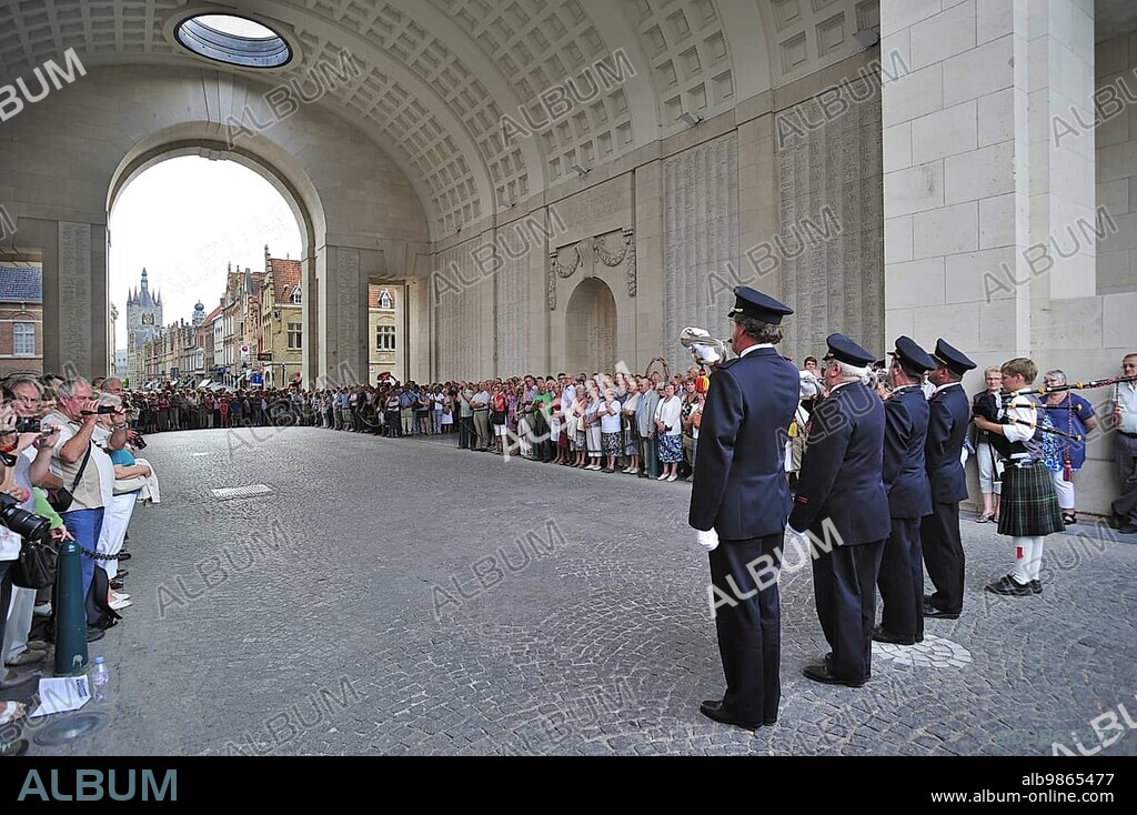 Last Post Ceremony under the Menin Gate Memorial to the Missing, a war memorial dedicated to the commemoration of British and Commonwealth soldiers who were killed in the Ypres Salient of World War I, Ypres, Belgium, Europe.