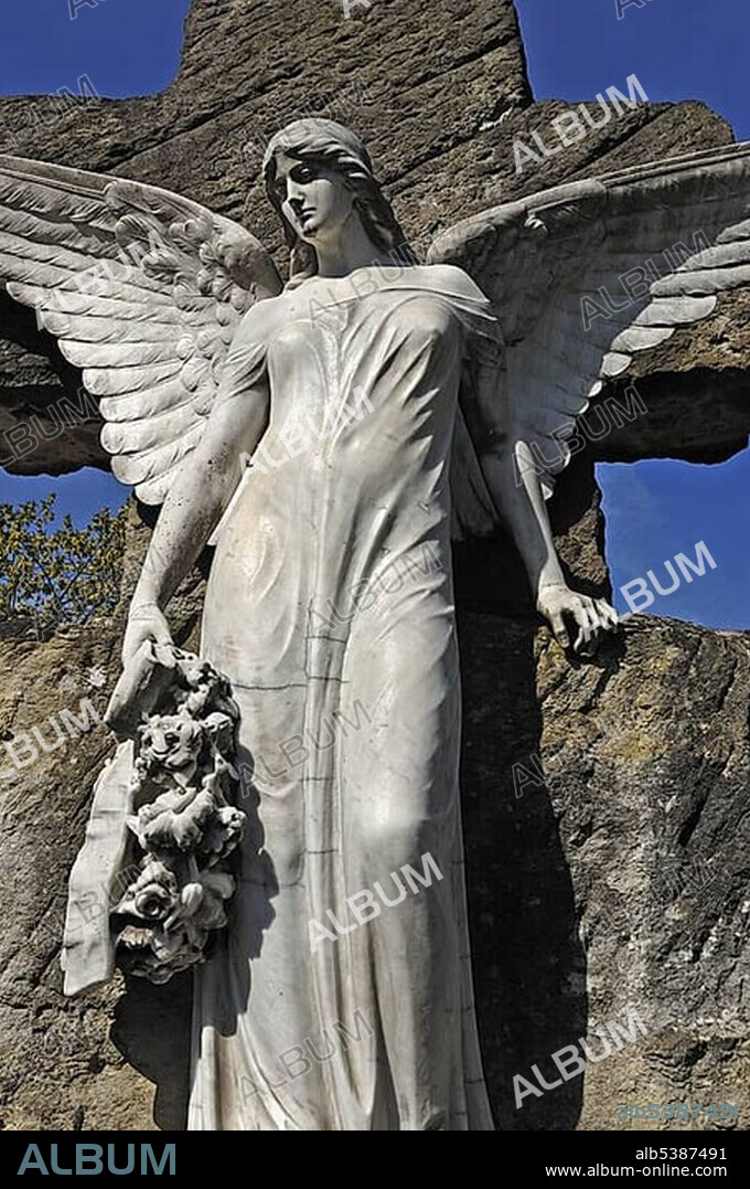 Big statue of an angel on a 19th century grave, Johannisfriedhof cemetery, founded in the 13th century, Brueckenstrasse street 9, Nuremberg, Middle Franconia, Bavaria, Germany, Europe.