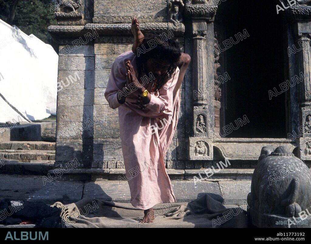 Yoga. Fakir contorting his body in difficult yogic poses. Kathmandu.