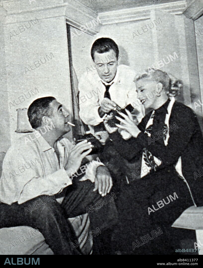 Ginger Rogers and Paul Douglas on the set of Forever Female, a 1953 black and white film directed by Irving Rapper. It stars Ginger Rogers and William Holden. It won a Golden Globe in 1954. Ginger Rogers (born Virginia Katherine McMath; July 16, 1911 - April 25, 1995) was an American actress, dancer, and singer during the Golden Age of Hollywood. Paul Douglas Fleischer (April 11, 1907 - September 11, 1959), known professionally as Paul Douglas, was an American actor.