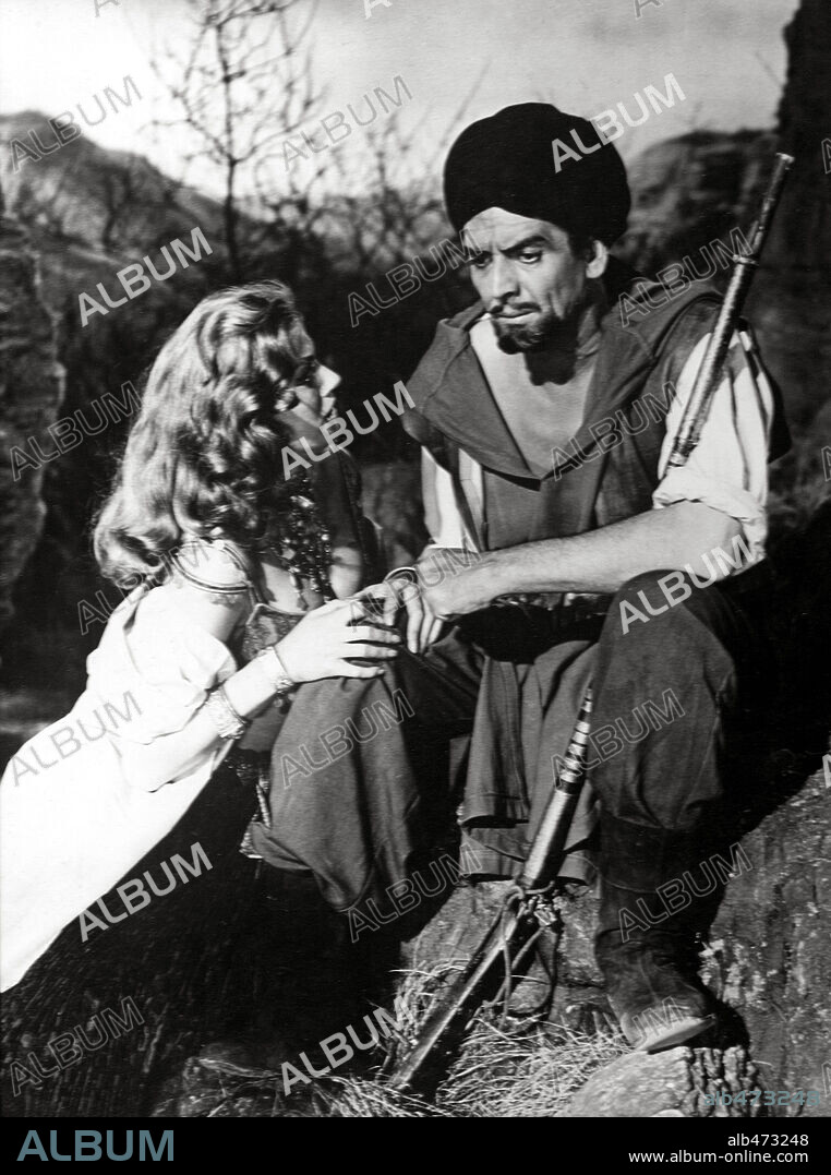 ANITA EKBERG and VICTOR MATURE in ZARAK, 1956, directed by TERENCE YOUNG.