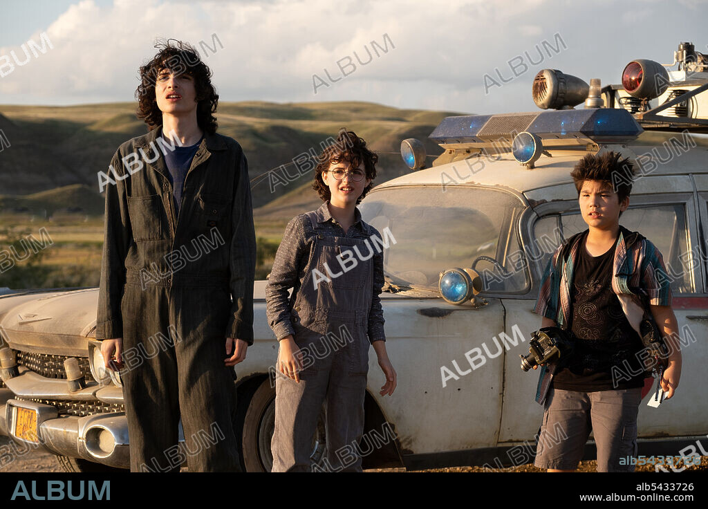 FINN WOLFHARD, KIM LOGAN and MCKENNA GRACE in GHOSTBUSTERS: AFTERLIFE, 2021, directed by JASON REITMAN. Copyright COLUMBIA PICTURES.