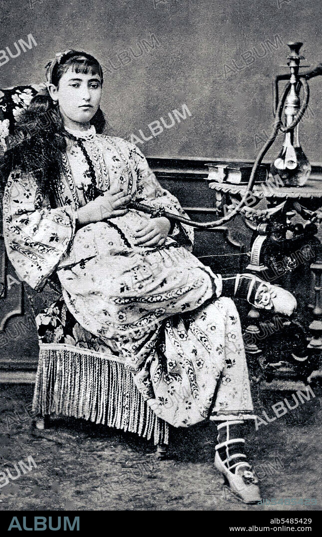 A hookah (Hindustani: huqqah), also known as a waterpipe, is a single or multi-stemmed (often glass-based) instrument for smoking in which the smoke is cooled and filtered by passing through water. The tobacco smoked is referred to as narghile or shisha (sheesha) in the United Kingdom, United States and Canada.
