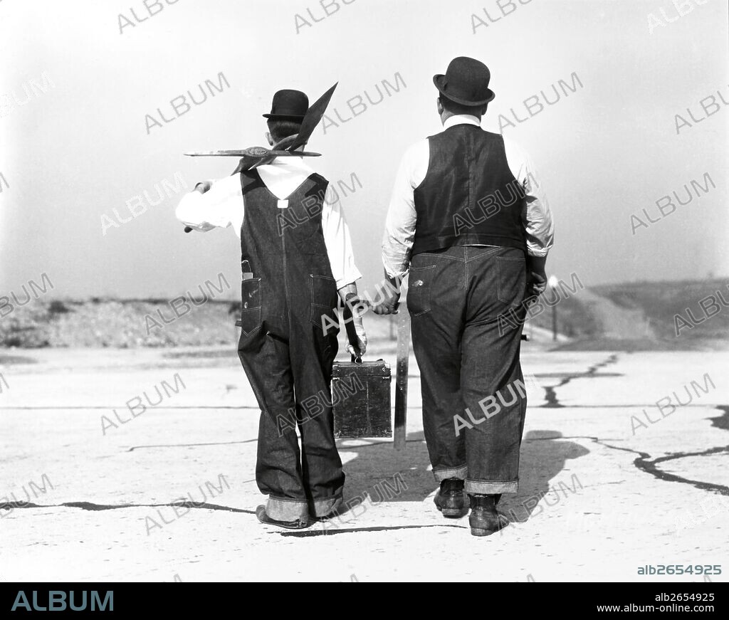 OLIVER HARDY and STAN LAUREL in THE FINISHING TOUCH, 1928, directed by CLYDE BRUCKMAN. Copyright HAL ROACH/MGM.