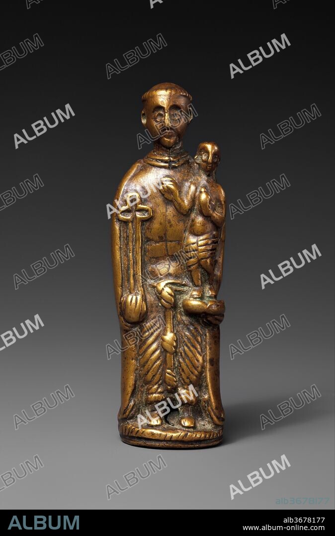 Pendant: Saint Anthony of Padua. Culture: Kongo peoples; Kongo Kingdom. Dimensions: H. 4 in. (10.2 cm). Date: 16th-19th century.
This brass pendant of St. Anthony of Padua holding the infant Christ is an exceptional example of the casting prowess of Kongo artists. The diminutive size of this brass object and the loop posited at the tip of its inverted triangular hood indicate that it is a pendant. Originally cast with crisp detail, portions of the figure are now shiny and worn, suggesting that the pendant came into contact with the skin through active wear, or that it was repeatedly handled. Altogether, the saint's impression is one of calm alertness, like that of the wide-eyed Christ child, who looks forward as he stretches out his arm across the chest of the elder saint, gesturing towards the outlined crucifix in the saint's right hand. Though only an infant, Christ is half the size of the saint, emphasizing his importance in Christian theology. His physical proximity to the cross alludes to his future sacrifice, as does the goldfinch he holds, a symbol of both his crucifixion and resurrection. He stands upon an open book, an allusion to a story in which Christ is said to have appeared out of the book that St. Anthony was meditating over. Each figure has bare feet, and wears a robe whose folds have been indicated by carefully incised parallel lines. The toes and fingers are articulated with simple lines. St. Anthony stands feet shoulder width apart, toes pointed out, on a circular base with vertical hatching. His habit has been carefully observed and replicated, from the double-band at the neck to the sweeping cape that falls to his feet, framing the garment beneath. The detail of his triple-knotted belt shows not only the sculptor's powers of observation, but also hold symbolic power as representations of the three vows of the Franciscan order (poverty, chastity, and obedience). The saint's eyes are formed by circular outlines framed by high arching eyebrows that flow directly into the triangular nose. Above his short forehead, his head is bald except for a ring of hair. Known as a tonsure, this shaved hairstyle represented an act of religious humility.
A dark black resin and green patination have also accumulated in the crevices of the carving, and around the figures' feet. The interior of the hanging loop is worn from use, indicating that something was threaded through the loop to suspend the pendant form. Examinations performed in 2001, 2002, and 2013 by Conservator Ellen Howe, Conservator Leslie Gat, Conservation Scientist Mark Wypyski, Conservation Scientist Adriana Rizzo, and Conservation Fellow Ainslie Harrison, suggest that the brass pendant was cast using the lost wax casting technique. The pendant is similar to another example in the Met's collection, incorporated into a Kongo crucifix, an unusual depiction of the saint.
Catholic since the late fifteenth century, the Kongo Kingdom fostered devotion to many saints. St. Anthony was among the most popular, and was called Toni Malau ("Anthony of Good Fortune") for his purported powers of healing and good luck. The figure's attributes confirm his identity: the cross held in his proper right hand, the Christ child balanced on the low curve of his left elbow, and his simple habit. The additional iconography of the goldfinch and book are indicative of early models of the saint; these attributes generally grew smaller, or completely disappeared in later models. The popularity of Saint Anthony in Kongo was part of an early modern phenomenon in which the saint was equally popular in Europe, South America, and Africa. Born in Lisbon, Portugal in 1195, the Franciscan brother Anthony was canonized just one year after his 1231 death in Padua, Italy. Claimed as a patron saint by both Portugal and Italy, religious missionaries from both regions spread his cult globally. Soon after their 1645 arrival in Kongo, Italian Capuchin fathers began to spread the cult of St. Anthony. While most early images of the saint were brought from Europe, some came to Africa via other sources. Most missionaries traveled indirectly to Africa via Brazil, where they sometimes purchased religious sculptures from Portuguese colonial workshops. In the Kongo kingdom, locally made figures of Saint Anthony based on European prototypes became common around the eighteenth century. The practice most likely related to the saint's popularity in the kingdom, and was possibly tied to the short-lived Antonian movement, during which the Kongo noble woman Beatriz Kimpa Vita gained a significant political following after declaring herself the reincarnation of St. Anthony. To the chagrin of European missionaries, the Antoniens adopted the metal, ivory, and wooden images of St. Anthony, wearing the sculpture of the saint they called Toni Malau as a sign of their allegiance and as a protective amulet. Known as "Little Anthonies," her followers occupied the capital and traveled throughout the Kongo kingdom wearing their medallions, spreading the message of Dona Beatriz, who believed that Africanizing the church would strengthen the Kongo state, which was in disarray after a series of civil conflicts and the rising effects of the Transatlantic slave trade.
While the Antonien movement was successfully put down in 1706, St. Anthony remained popular long after. Considered the "Saint of Good Fortune" or the "Saint of Prosperity," Toni Malau figures continued to be used prominently in Kongo as forms of protection from illness, the troubles of childbirth, or other problems. 
Kristen Windmuller-Luna, 2016
Sylvan C. Coleman and Pam Coleman Memorial Fund Fellow in the Department of the Arts of Africa, Oceania, and the Americas.