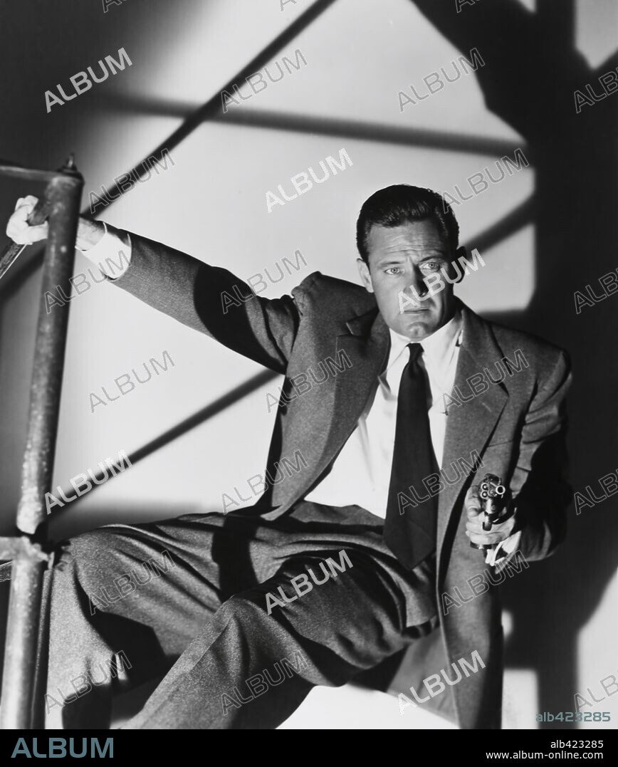 WILLIAM HOLDEN in THE TURNING POINT, 1952, directed by WILHELM DIETERLE. Copyright PARAMOUNT PICTURES.
