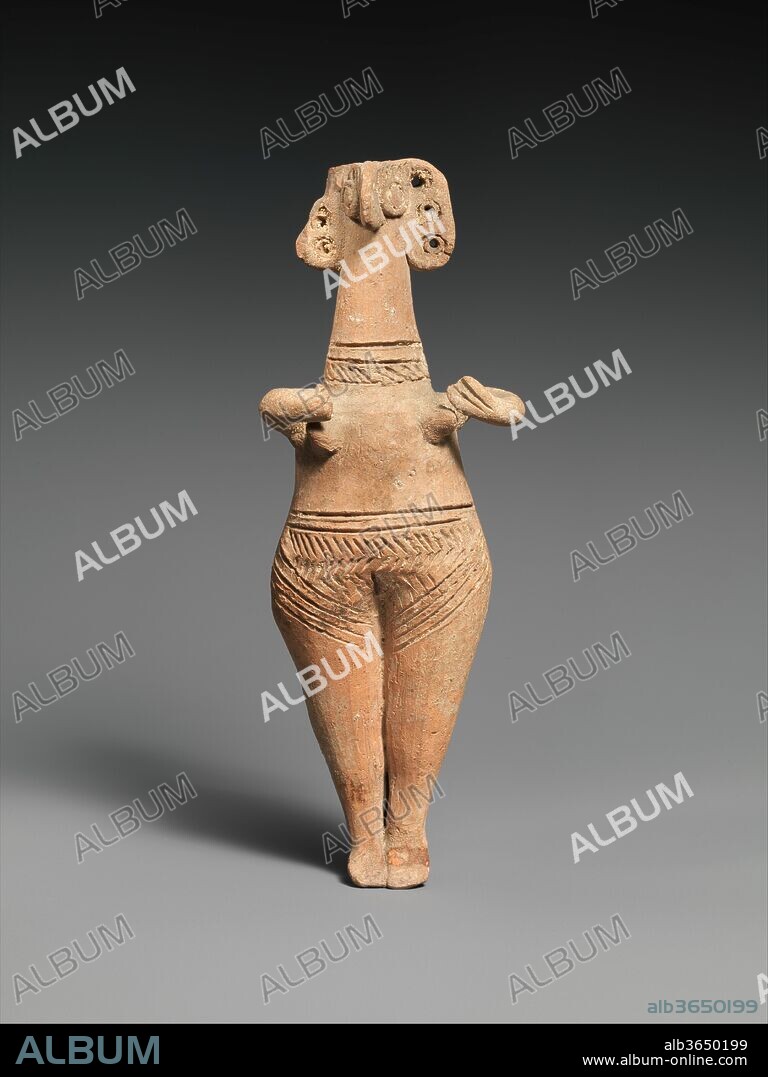 Terracotta statuette of woman with bird face. Culture: Cypriot. Dimensions: H. 7 9/16 in. (19.2 cm). Date: ca. 1450-1200 B.C..
This figurine is typical of Cypriot coroplastic art of the Late Cypriot II and III periods. The type, with the pubic triangle accentuated and the breasts clearly shown, is likely of Syrian origin, but Cypriot sculptors created their own variations.