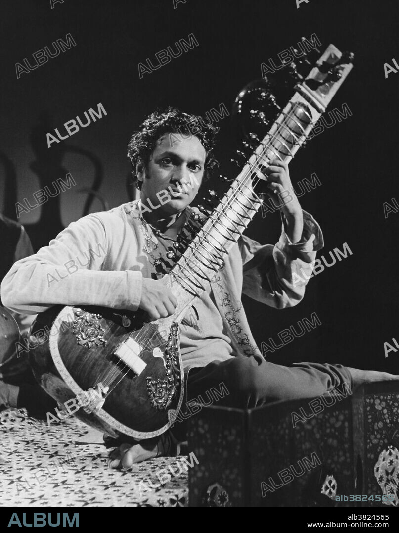 Undated image of the iconic sitar player Ravi Shankar. Ravi Shankar playing a classical Indian raga on sitar. Ravi Shankar (born April 7th, 1920) is an Indian musician and composer who plays the plucked string instrument sitar. He has been described as the most known contemporary Indian musician. Shankar is considered one of the top sitar players of the second half of the 20th century. He became known for a distinctive playing style in the middle and high registers that uses quick and short deviations of the playing string and his sound creation through stops and strikes on the main playing string.