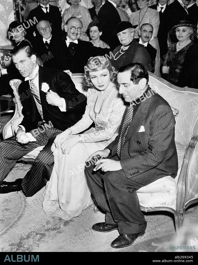 CLAUDETTE COLBERT, ERNST LUBITSCH and GARY COOPER in BLUEBEARD'S EIGHTH WIFE, 1938, directed by ERNST LUBITSCH. Copyright PARAMOUNT PICTURES.