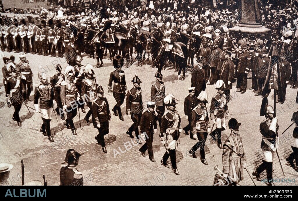 Funeral of King Edward VII, George V is shown walking with Kaiser Wilhelm II and the Duke of Connaught. Walking behind them is Prince Albert, with his eldest brother Prince Edward VIII.
