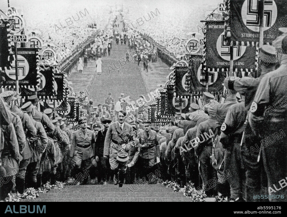 Hitler, Adolf Dictator (NSADP). 1889-1945. Thanksgiving day celebrations on the. "Bueckeberg" near Hameln, 30 Sept. 1934. Hitler mounting the speaker's platform to address 700000 farmers. Photo.