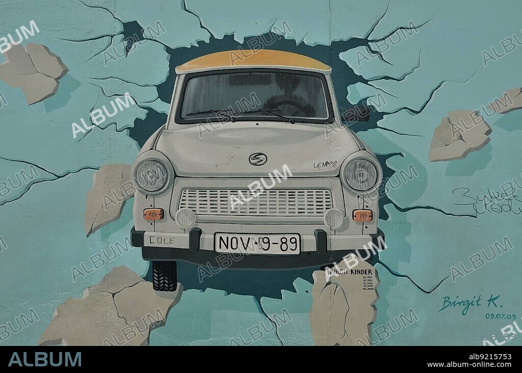Birgit Kinder, "Test the Best", mural, painting of a Trabant car breaking through the Berlin Wall, by Birgit Kinder, East Side Gallery, Berlin-Friedrichshain, Germany, Europe, PublicGround, Europe.